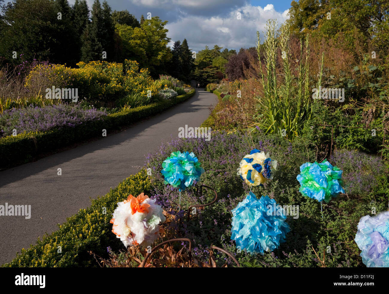 Plastic Flower Sculptures in one of the twin perennial borders, The National Botanic Gardens (1795), Dublin City, Ireland Stock Photo