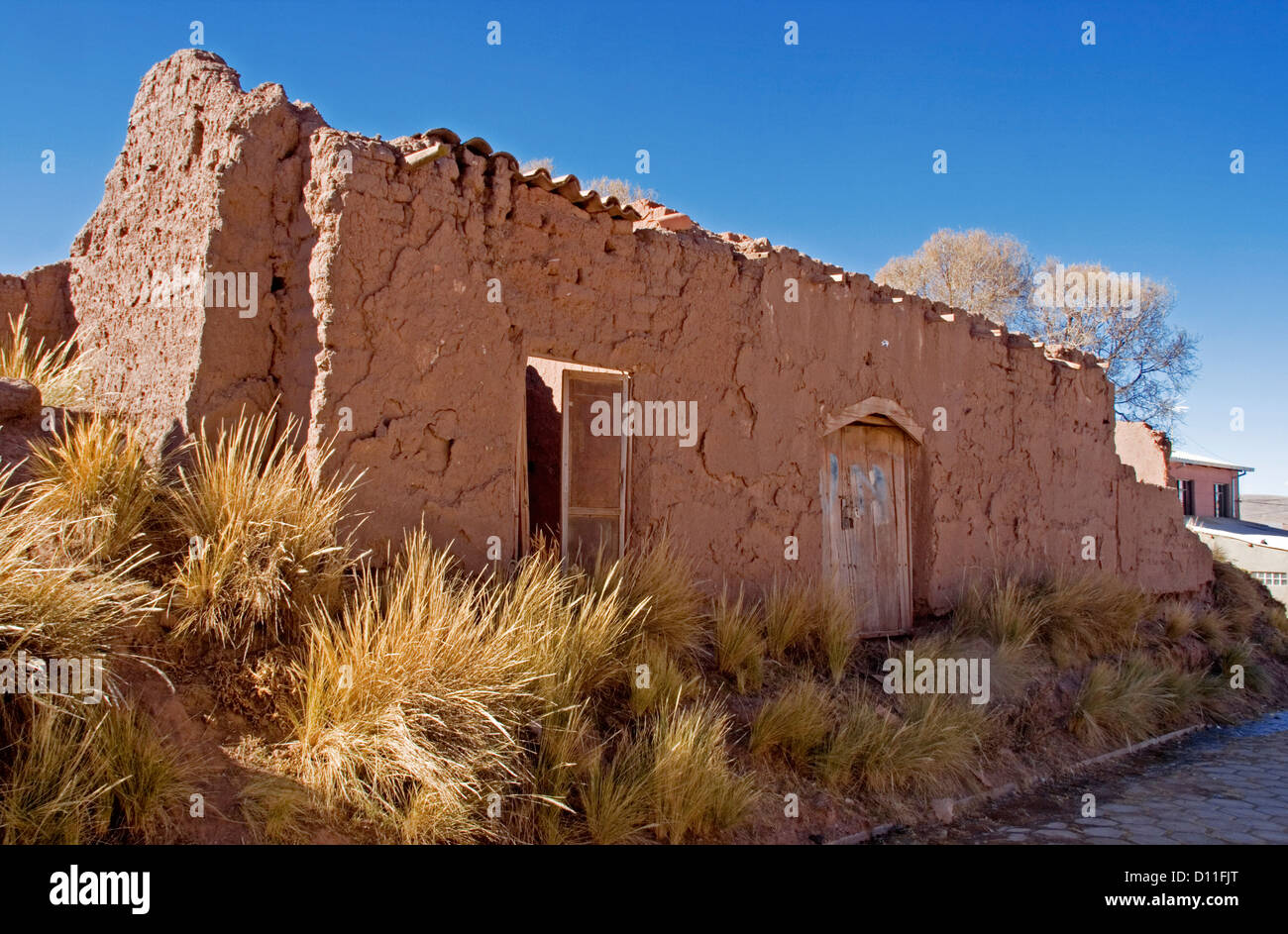 Ruins of adobe / mud brick house at Tiwanaku / Tiahuanacu village in the altiplano of Bolivia South America Stock Photo