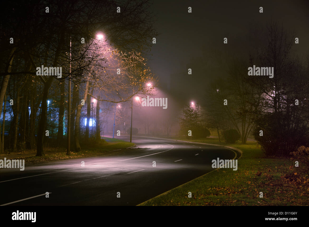 Foggy Misty Street Lights At Night Stock Photo