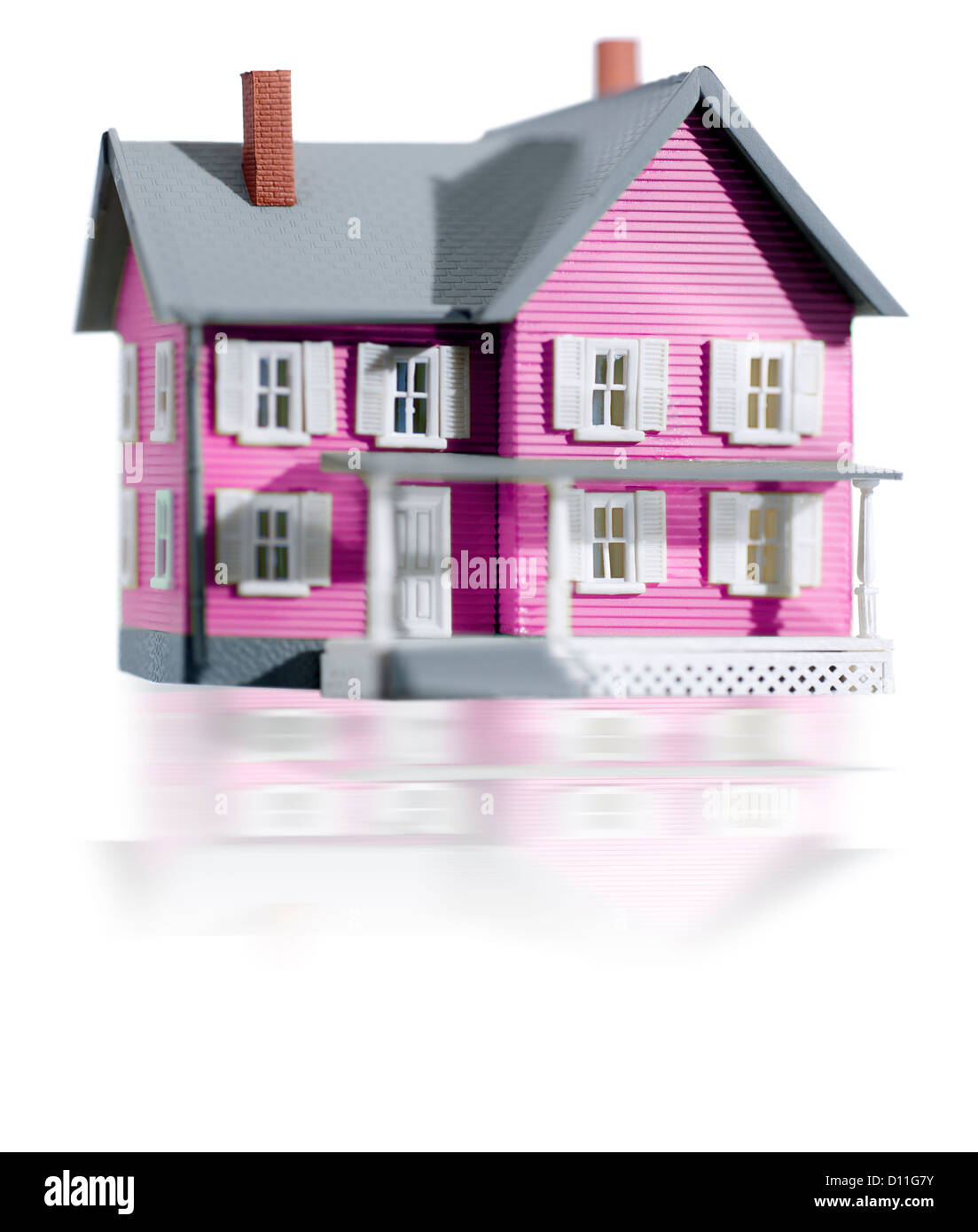 White and pink miniature farm house Stock Photo