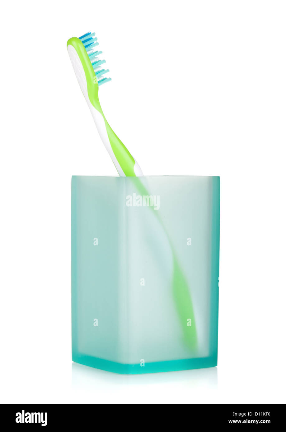 Toothbrush in a glass. Isolated on white background Stock Photo - Alamy