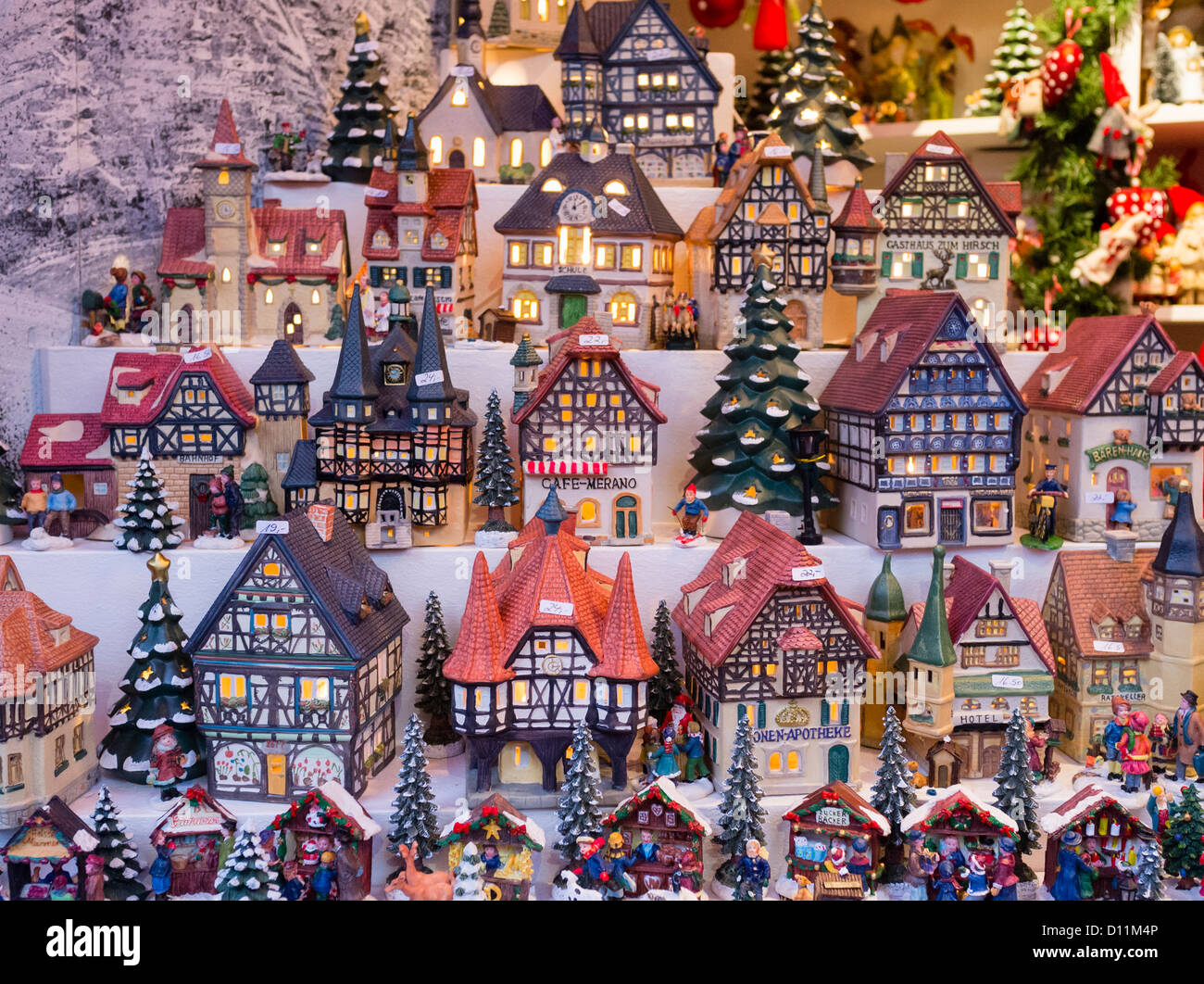 Traditional lanterns in shape of old model houses for sale on craft stall in Cologne Christmas Market in Germany in Germany Stock Photo