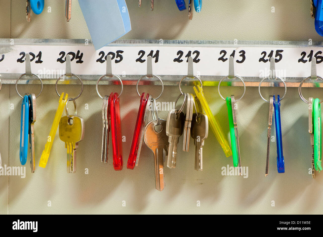 many keys hanging on hooks Stock Photo Alamy
