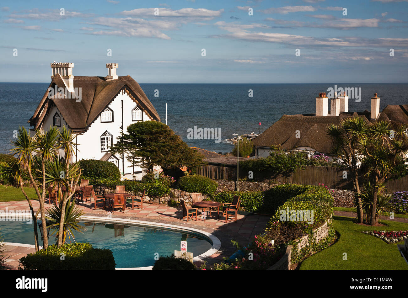 Thatched Cottages And A Swimming Pool Along The Ocean Sidmouth