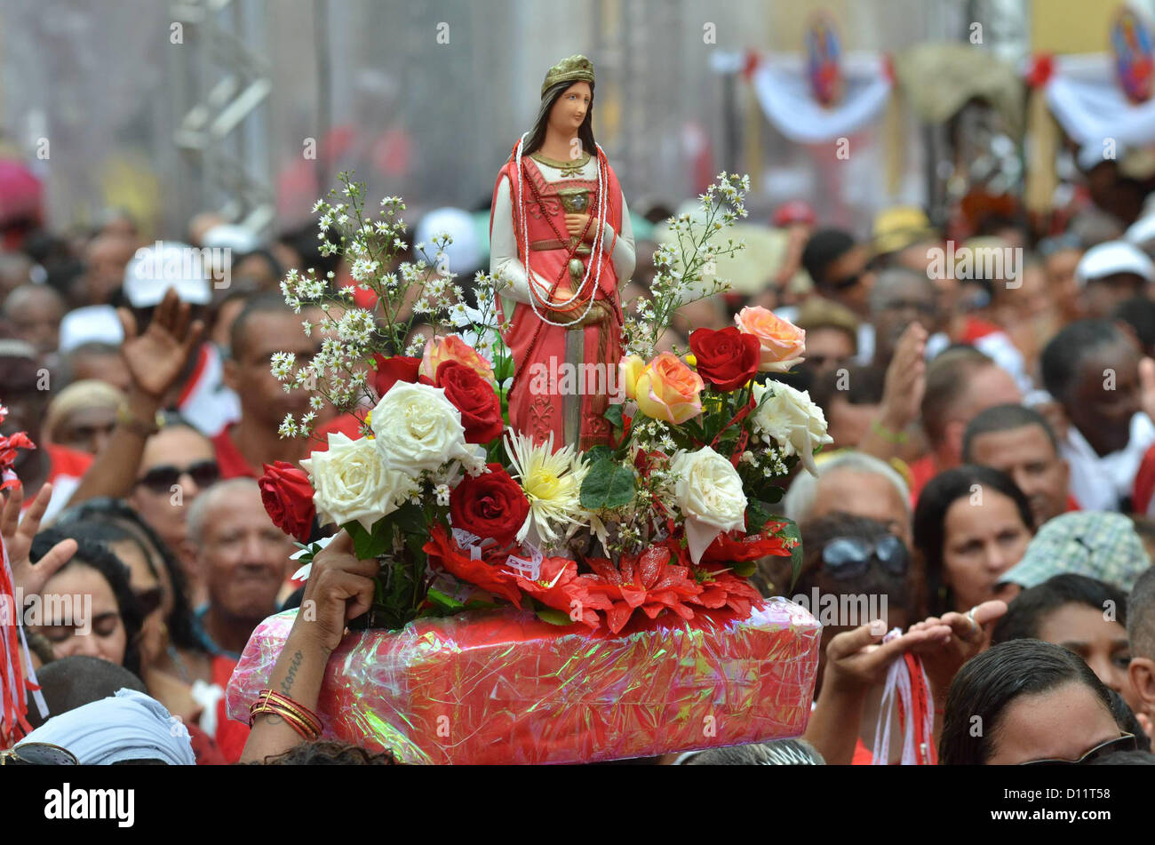 Devotees take part in a procession celebrating Saint Barbara, as part of a cycle of religious festivities in Salvador, Bahia state, in northeastern Brazil, on December 4, 2012. Photo: ERIK SALLES/BAPRESS Stock Photo