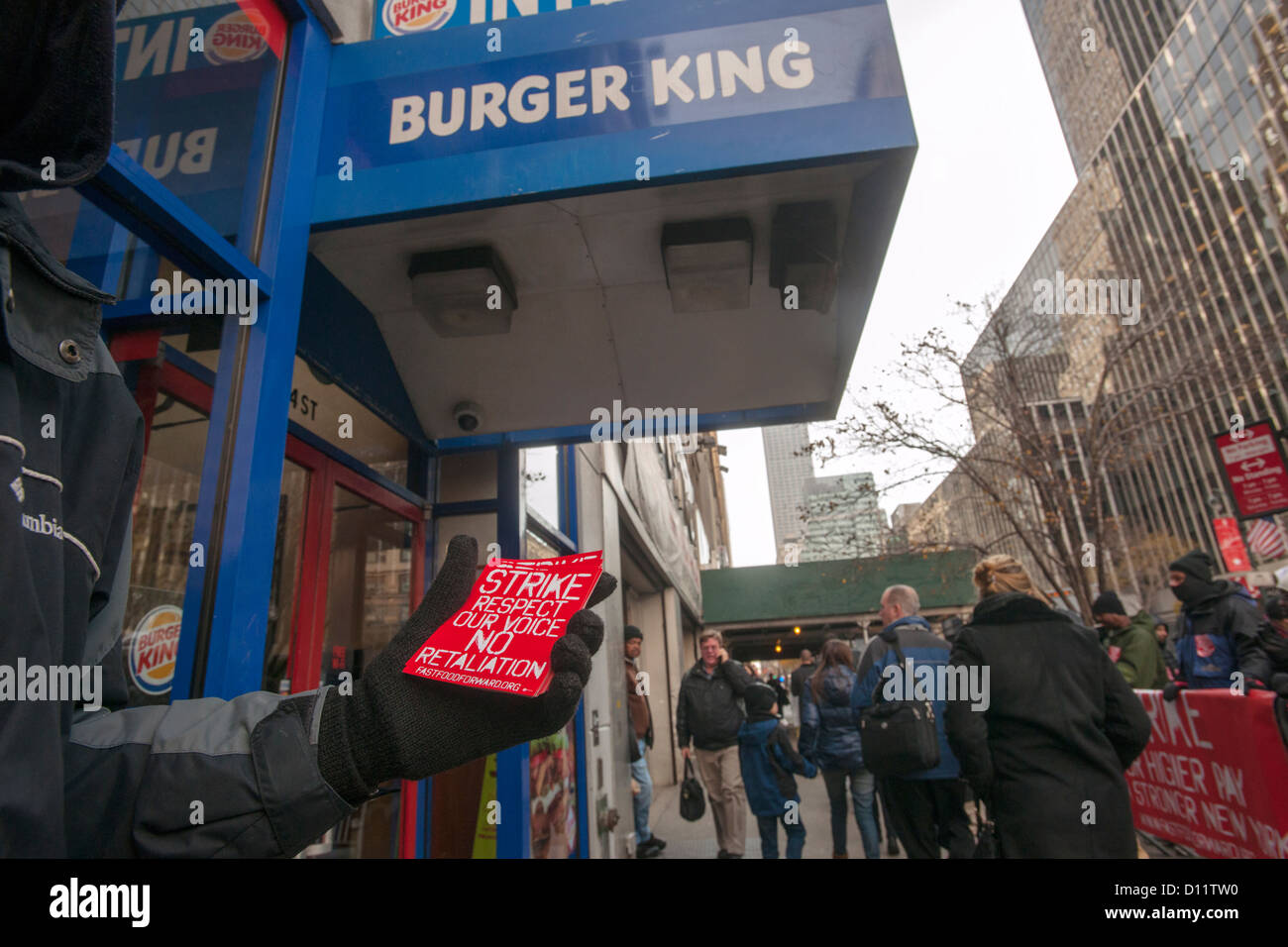 Workers at fast food restaurants engage in a oneday strike for a