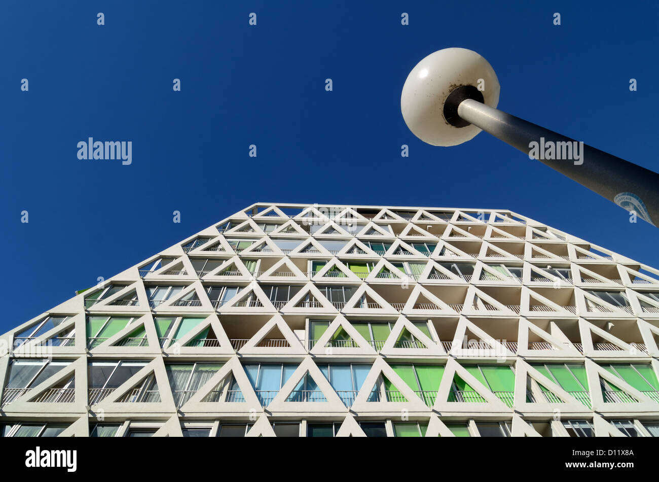 Triangular Window Patterns of Les Voiles Blanches Apartment Building & Modern Street Light La Grande-Motte Resort Town Hérault France Stock Photo