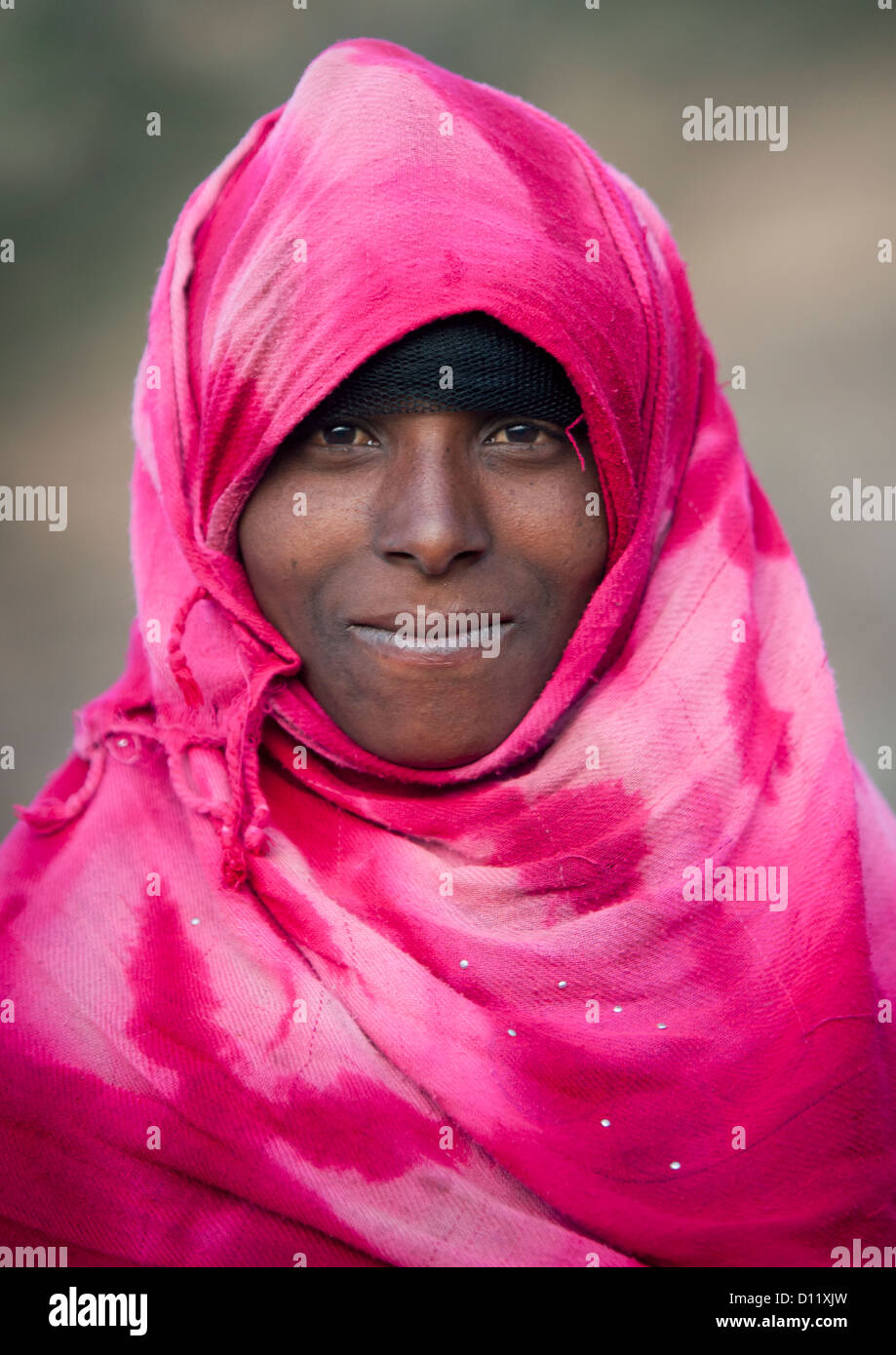 Portrait Of A Smiling Oromo Woman With Pink Headscarf, Dire Dawa, Ethiopia Stock Photo