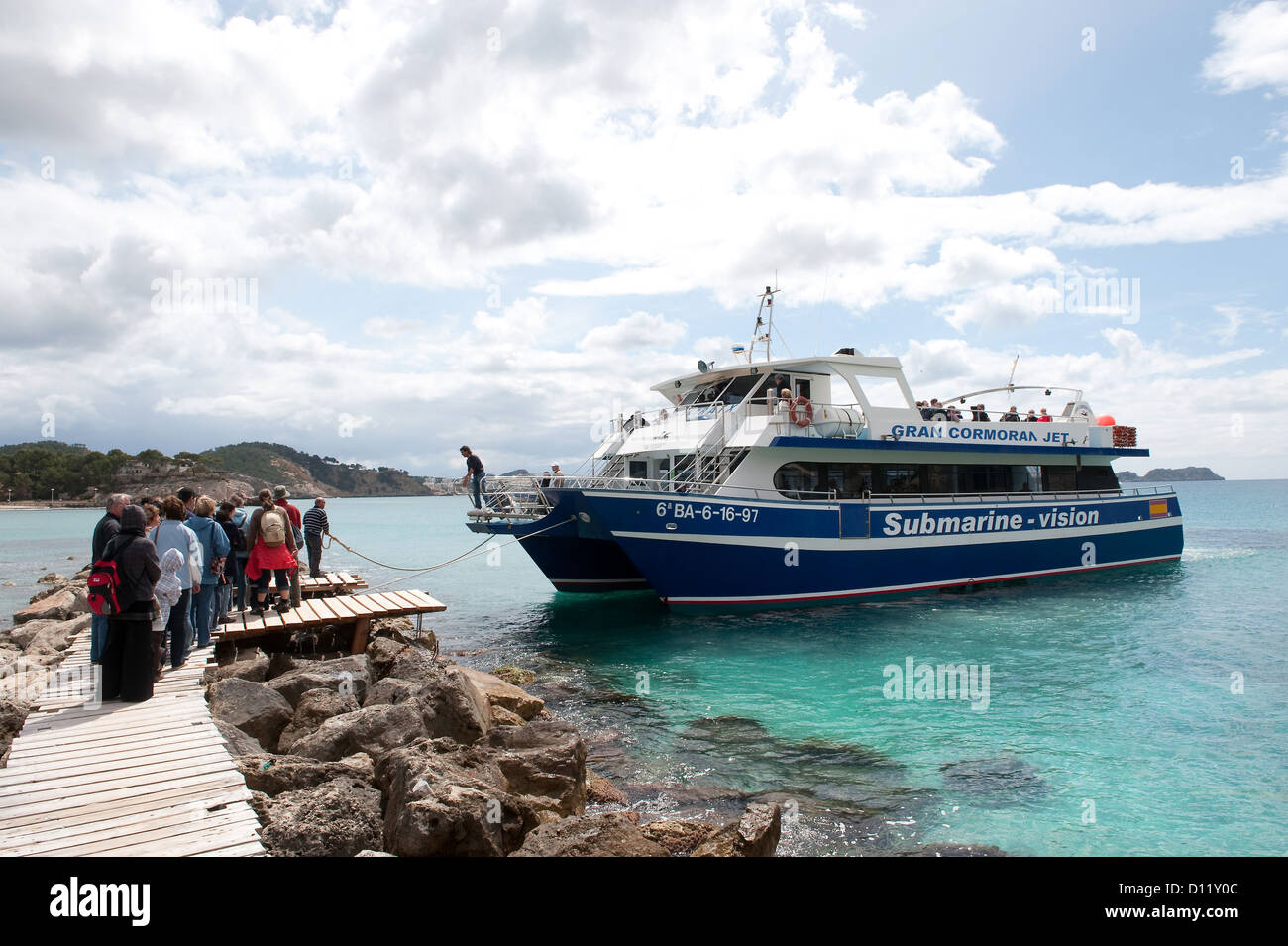 Peguera, Majorca, Spain, tourists waiting at the landing on her boat trip Stock Photo
