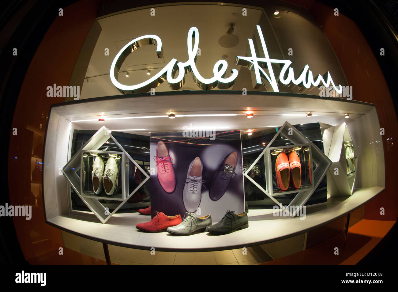 Shoes displayed in a window of a Cole Haan store in the Flatiron district in New York Stock Photo