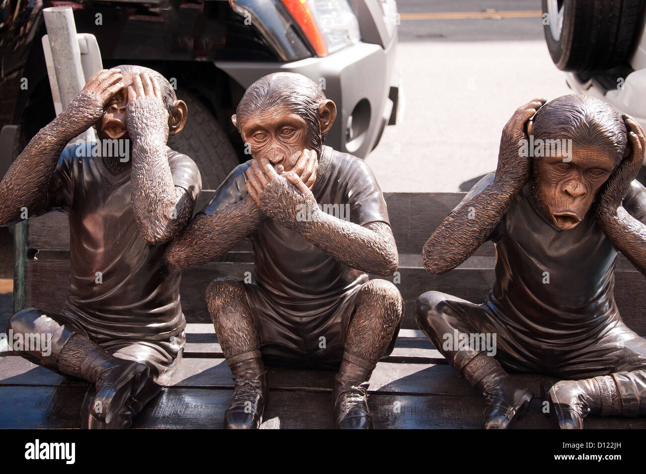 3 wise monkeys statue in Chinatown in San Francisco California USA