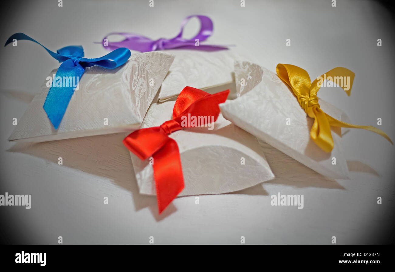 Paper boxes with colorful bows Stock Photo