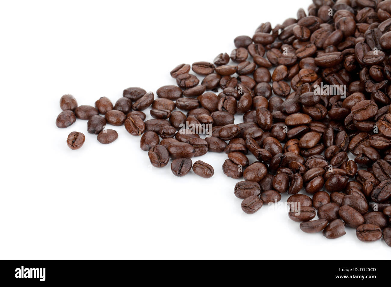 Heap of coffee beans. Isolated on white background Stock Photo - Alamy