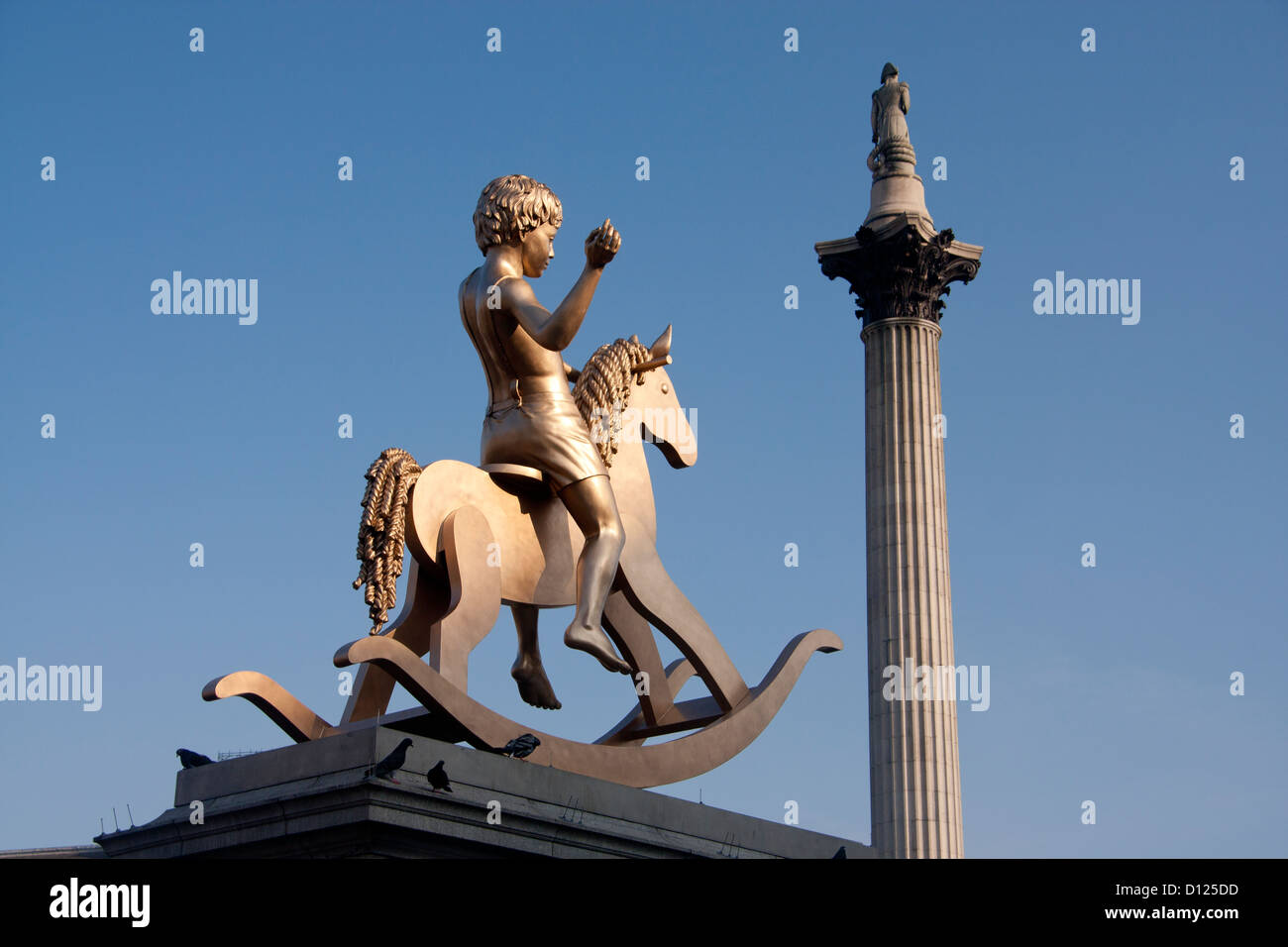 Child on rocking horse sculpture - Powerless Structures Fig 101 - on Fourth Plinth at Trafalgar Square London England UK Stock Photo