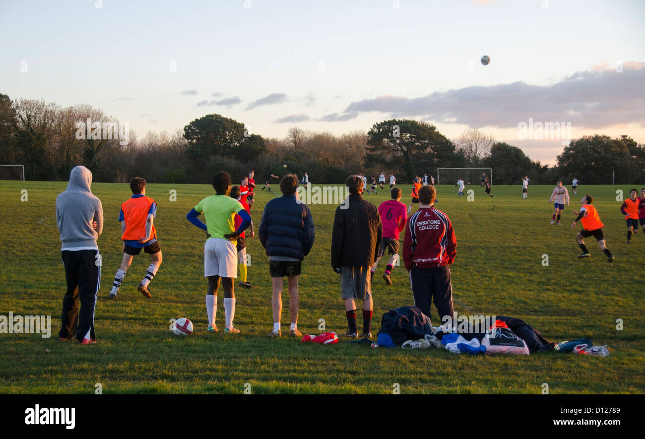 Group of players watching a football game, university sport, The Downs, Bristol, England, UK Stock Photo