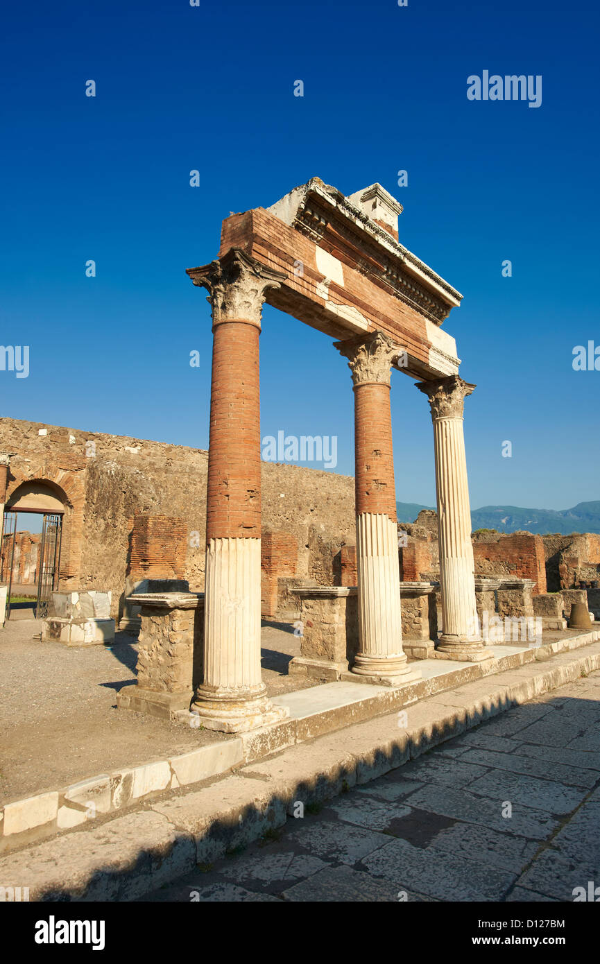 The Roman Corinthian Porticus, columns & tables of the money changers at the entrance of the Macellum in the Forum of Pompeii Italy Stock Photo