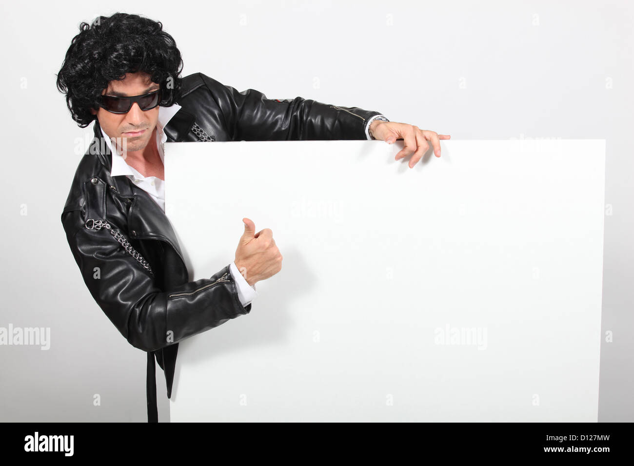 Man dressed as elvis hi-res stock photography and images - Alamy