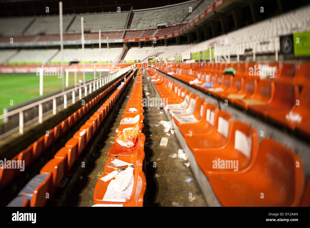 Seville, Spain, trash on the empty seats of a football stadium Stock Photo