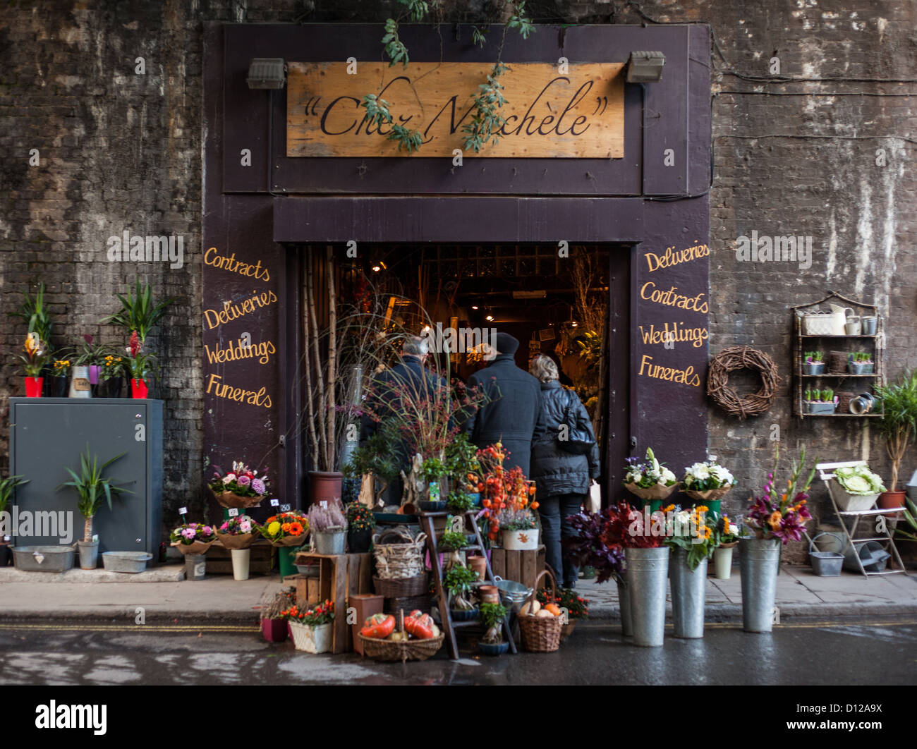 Chez Nichele flower market, Borough Market London with guests. Stock Photo