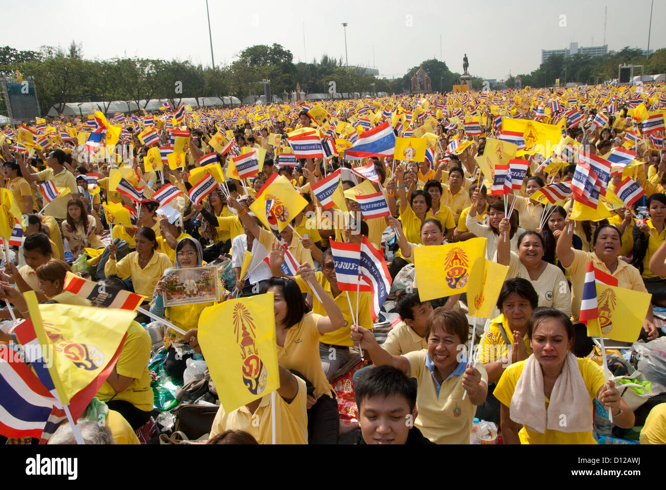 5 Dec 2012 , Bangkok , Thailand . Thai people, wearing yellow, wave ...