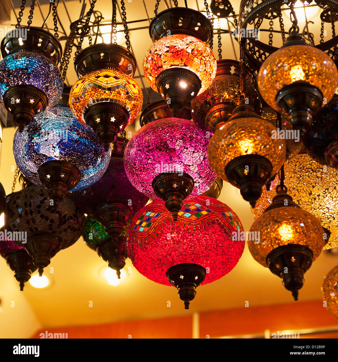 Low Angle View Of Illuminated Colourful Glass Light Fixtures; Istanbul Turkey Stock Photo