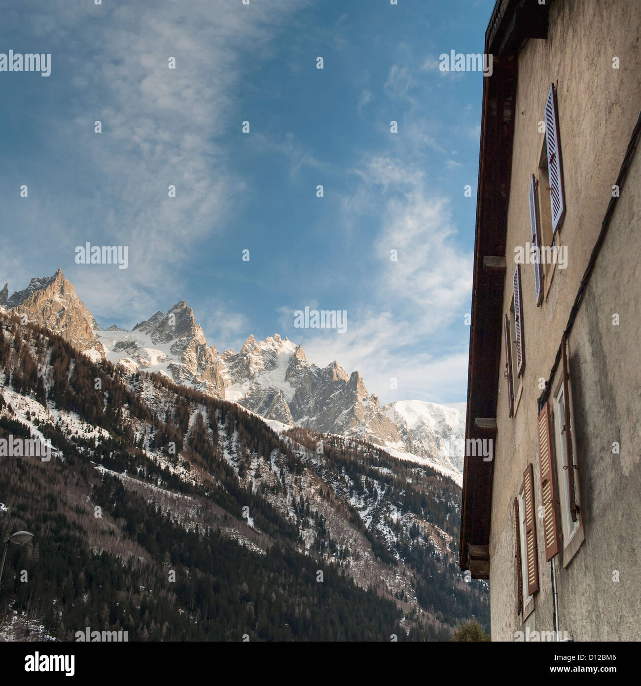 Low Angle View Of A Building Beside The French Alps; Chamonix-Mont-Blanc Rhone-Alpes France Stock Photo