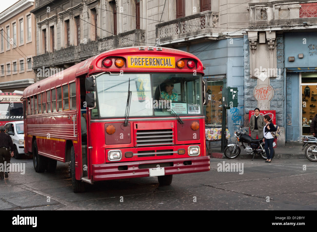 Red Bus In The Street; Guatemala City Guatemala Stock Photo