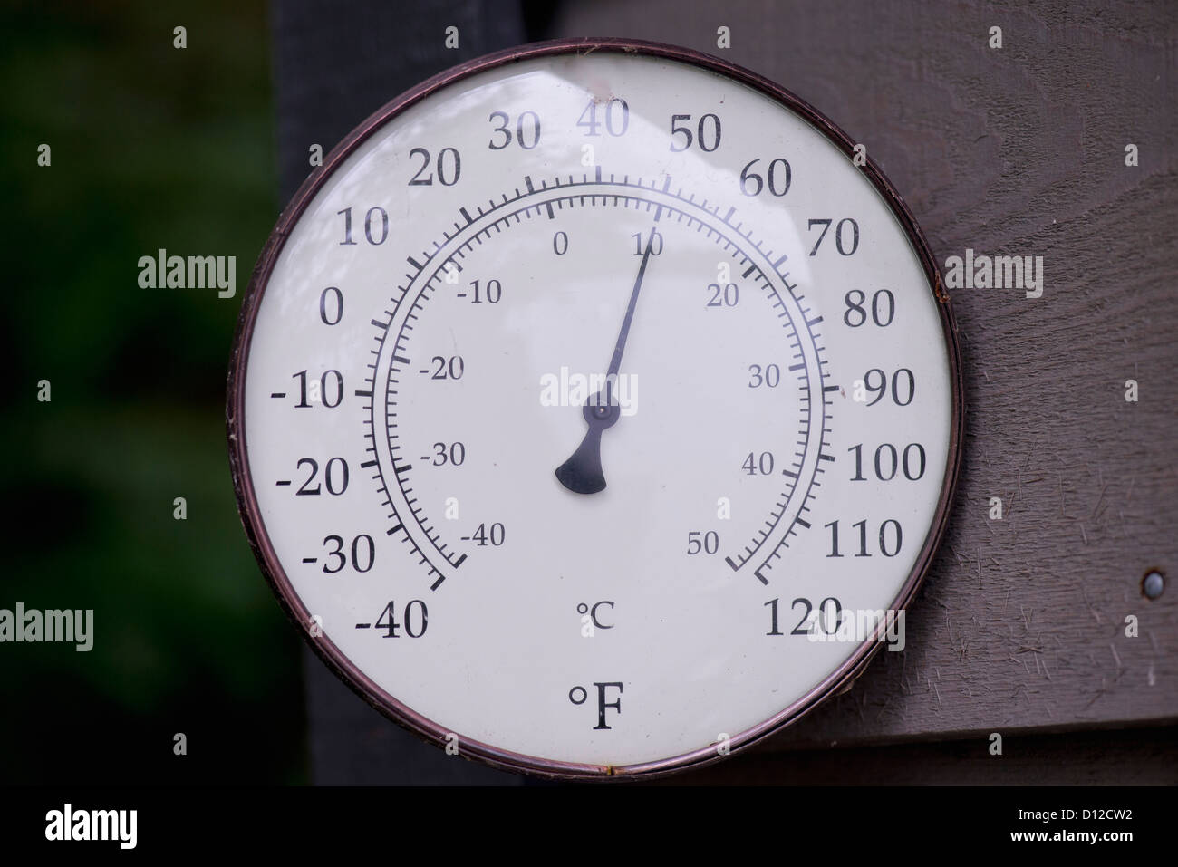 A Thermometer Reading 10 Degrees Celsius; Lake Of The Woods Ontario Canada Stock Photo