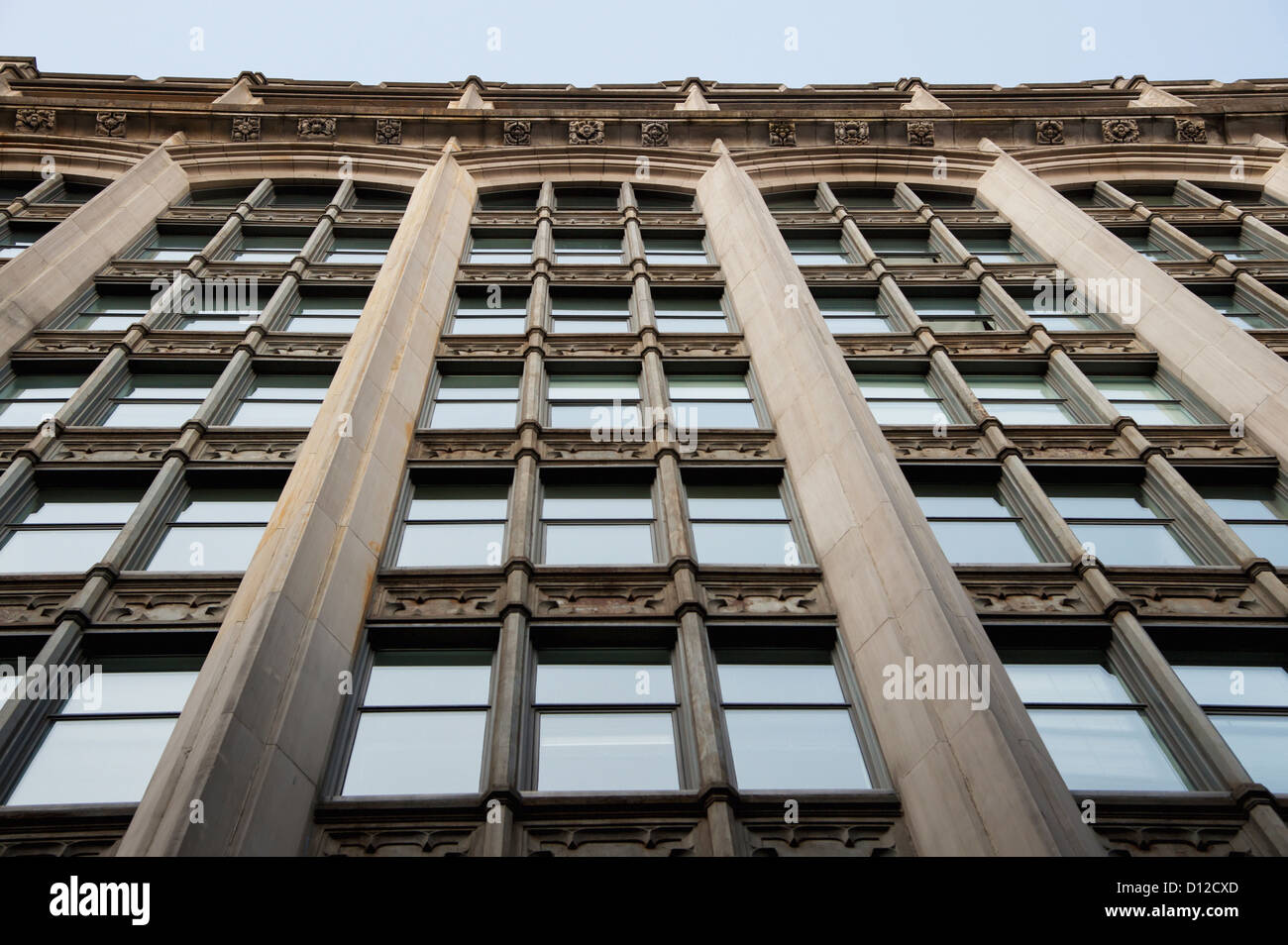 Low Angle View Of Windows On The Side Of A Building; Montreal Quebec Canada Stock Photo