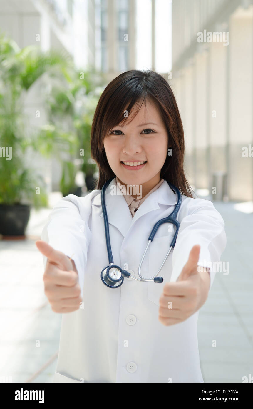 Chinese doctor thumbs up hi-res stock photography and images - Alamy