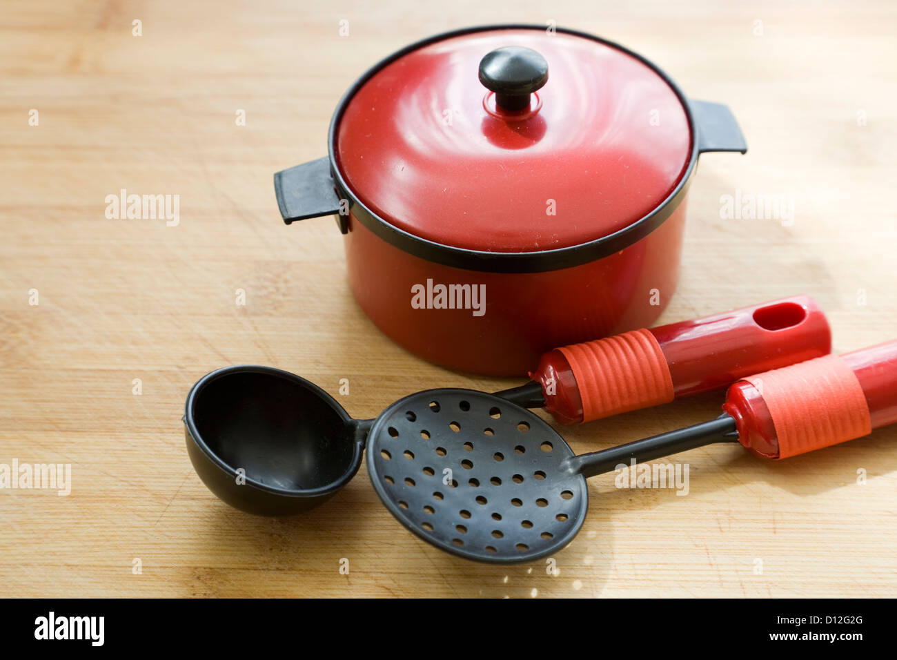 Cooking utensil on the chopping board Stock Photo