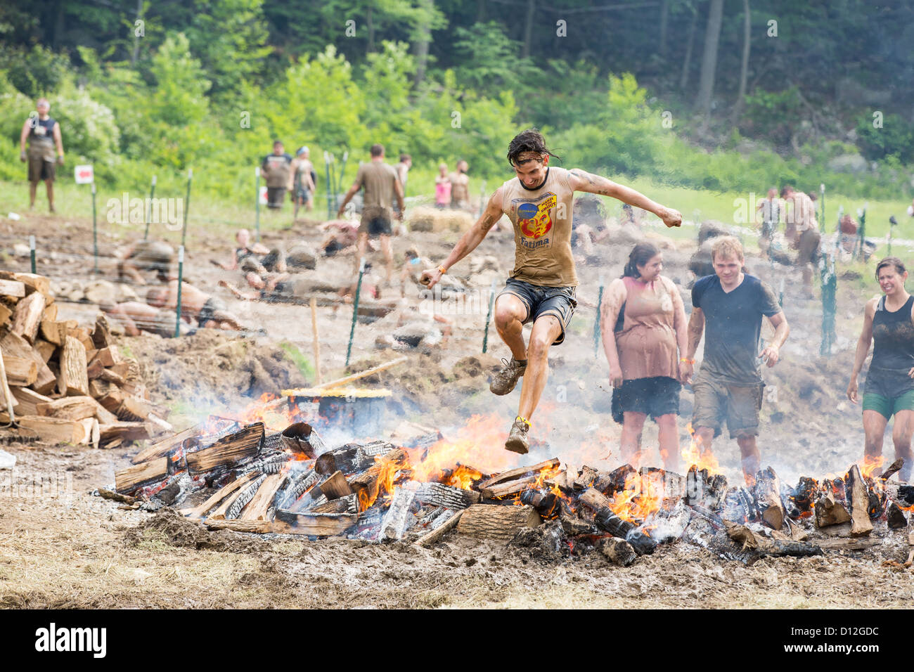 Participants of challenging sprint obstacle trail race, Spartan Race in Tuxedo New York, running