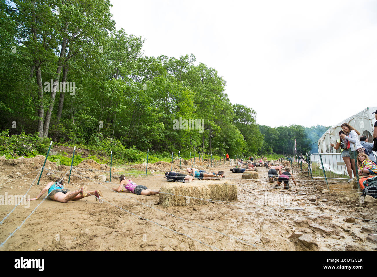 Participants of challenging sprint obstacle trail race, Spartan Race in Tuxedo New York, running