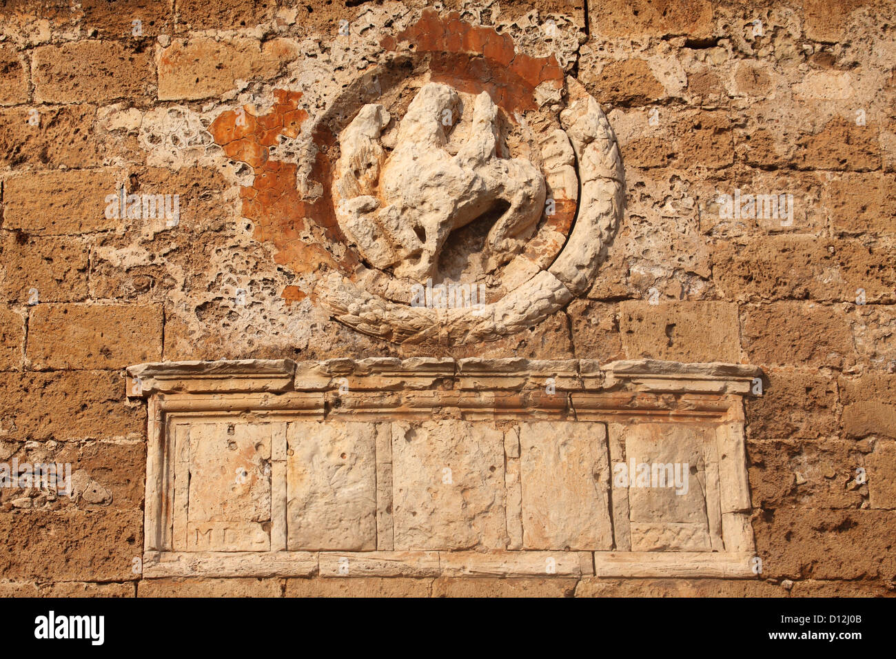 The Venetian lion symbol on the walls of the Sabbionara Bastion and Gate at Chania on Crete, Greece. Stock Photo