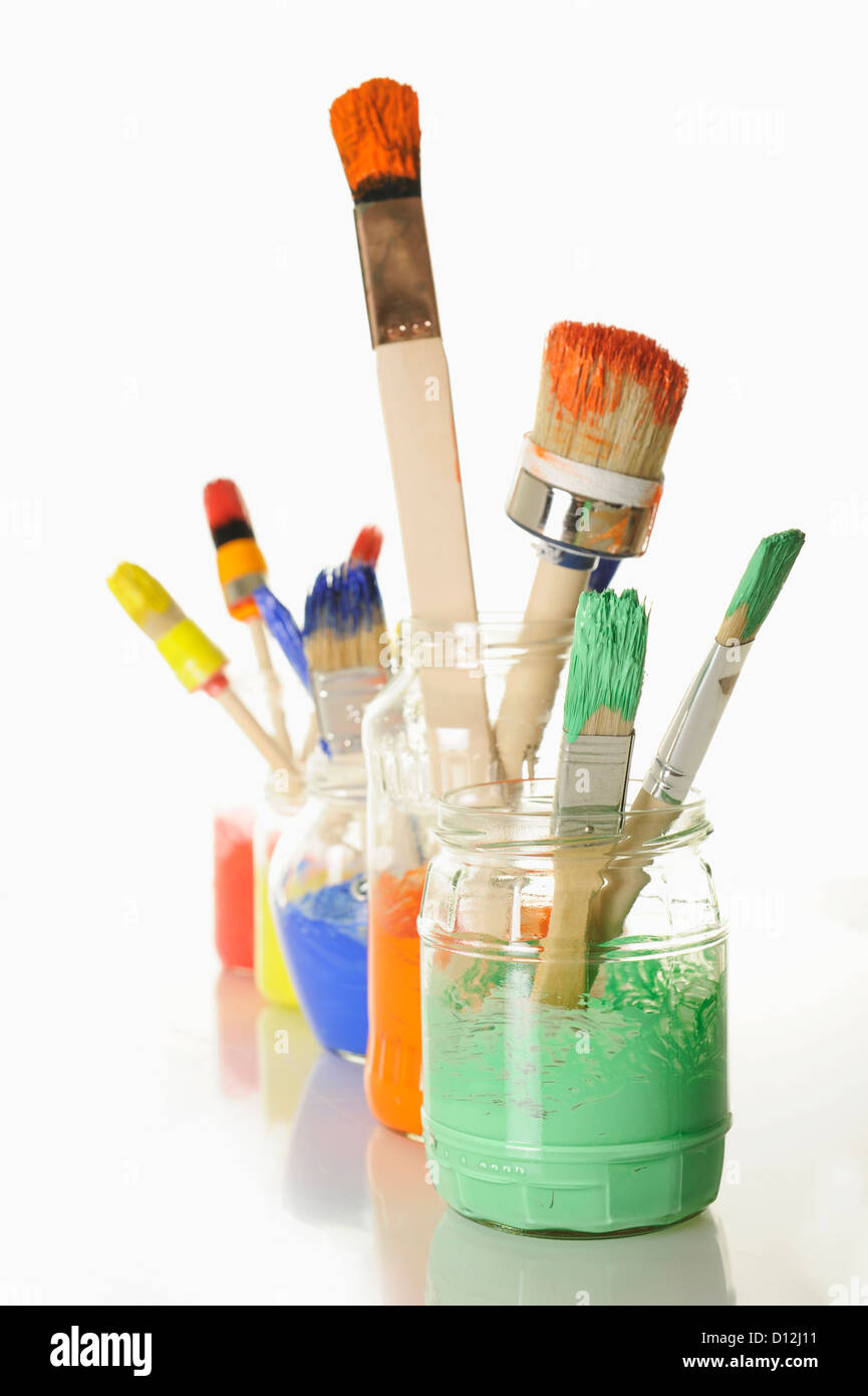Various paint brushes with watercolours, close up Stock Photo