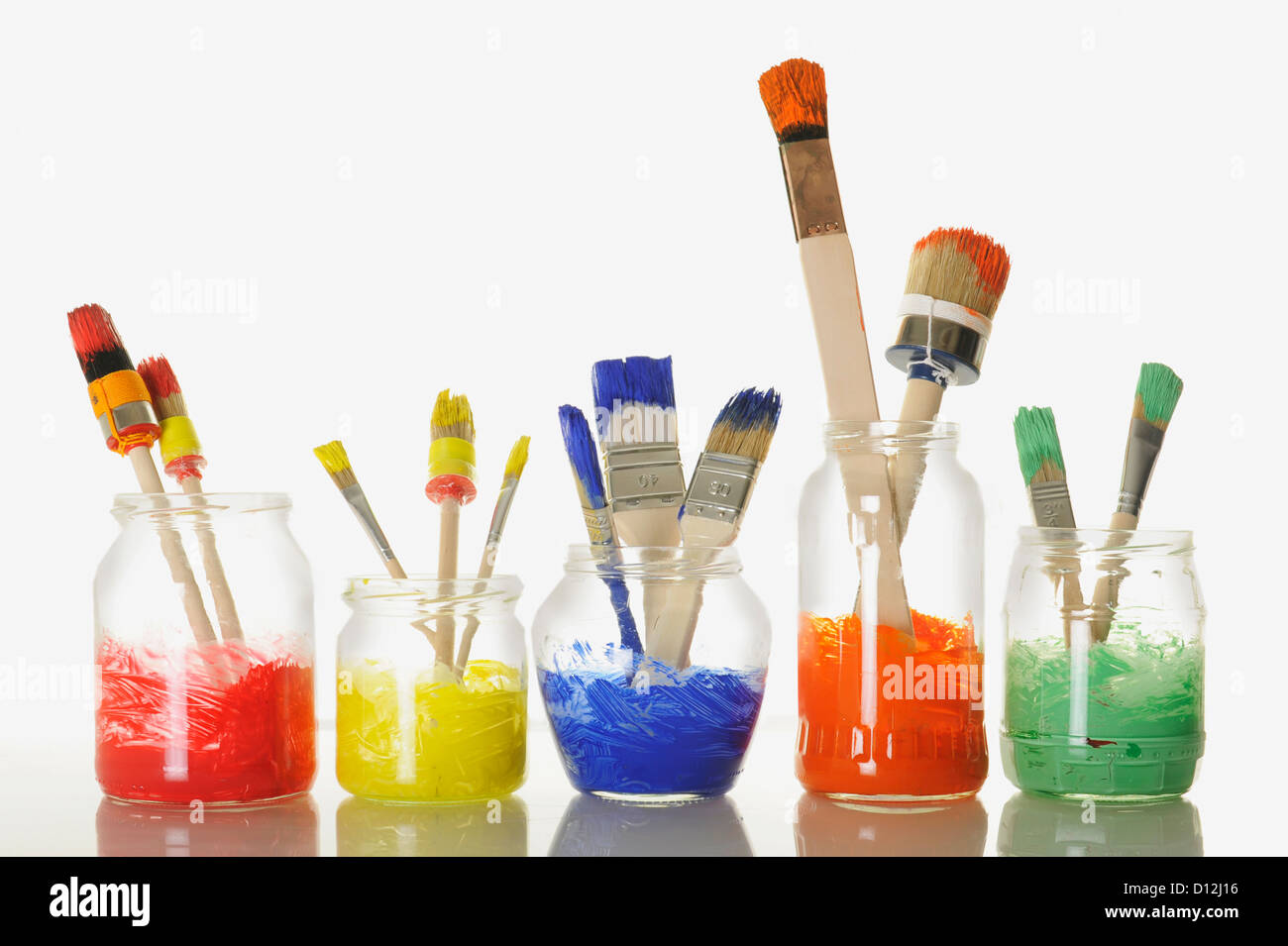 Various paint brushes with watercolours, close up Stock Photo