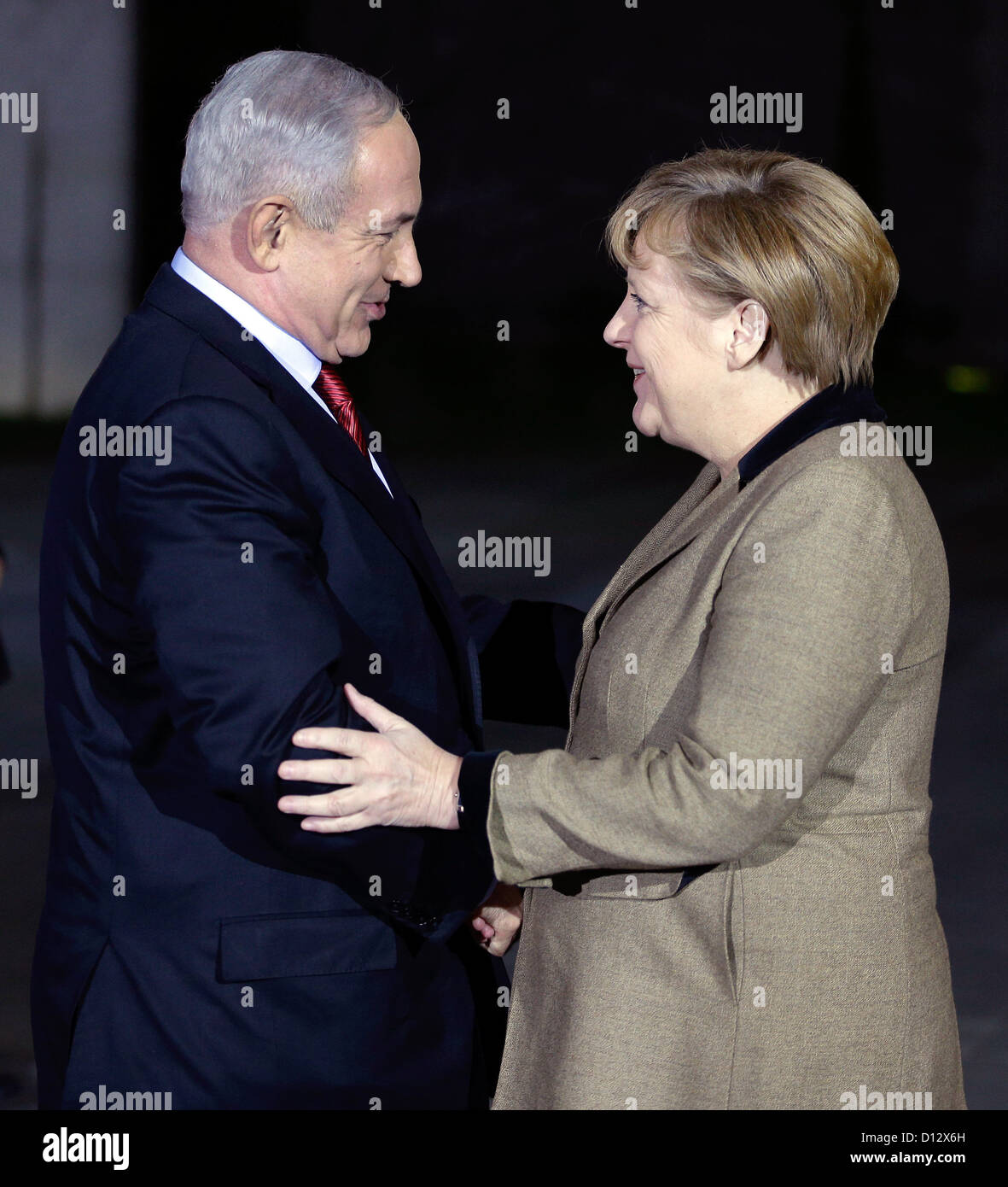 German Chancellor Angela Merkel, right, welcomes the Prime Minister of Israel, Benjamin Netanyahu, in front of the chancellery in Berlin, Germany, Wednesday, Dec. 5, 2012 for a joint dinner prior to intergovernmental talks on Thursday. Photo: Michael Sohn +++(c) dpa - Bildfunk+++ Stock Photo