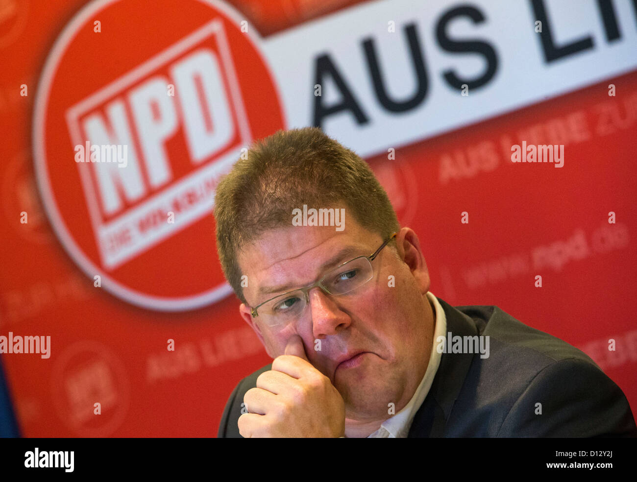 Chairman of the right-extremist National Democratic Party of Germany (NPD), Holger Apfel, speaks at a press conference in Pampow, Germany, 05 December 2012. The NPD press conference was held on the occasion of the Interior Ministers Conference which discusses the application for a ban of the right-extremist party troday. Photo: JENS BUETTNER Stock Photo