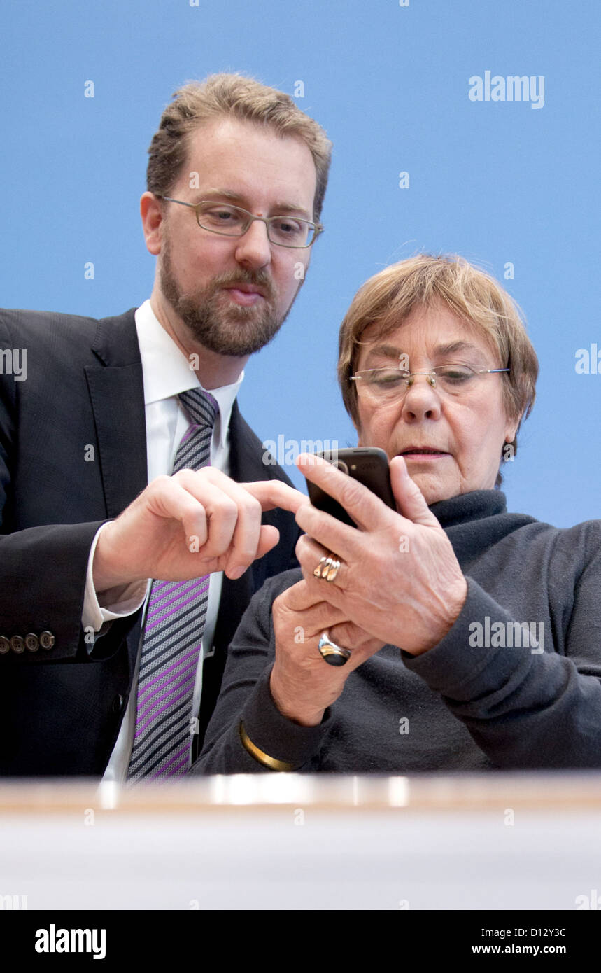 Christian Humborg, CEO Transparency International Germany, and Edda Mueller, Chairwoman of Transparency International Germany, present the 2012 Corruption Perception Index (CPI) in Berlin, Germany, 05 December 2012. The 2012 CPI ranked 176 countries by their perceived levels of corruption. Germany took rank 13 with 79 of 100 points compared to Greece, which was ranked on 94 with 36 of 100 points. Photo: JOERG CARSTENSEN Stock Photo