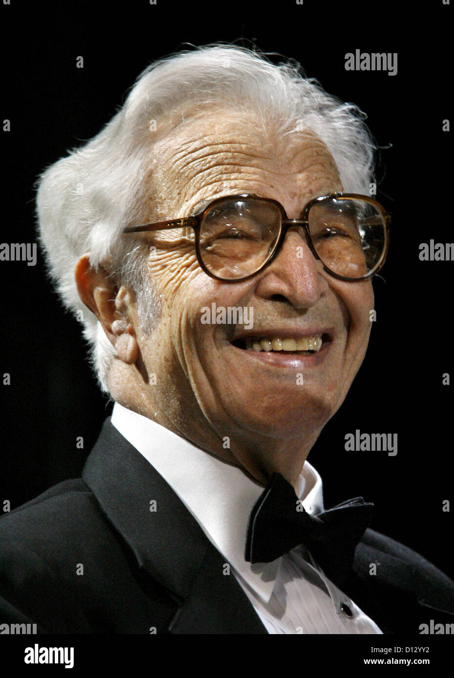 (dpa) - US American jazz pianist Dave Brubeck smiles during his concert at the 'Schauspielhaus' theatre in Nuremberg, Germany, Wednesday 16 November 2005. Brubeck performed together with his 'Dave Brubeck Quartet' in the course of events celebrating the 60th anniversary of the trials of war criminals in Nuremberg. Photo: Daniel Karmann Stock Photo