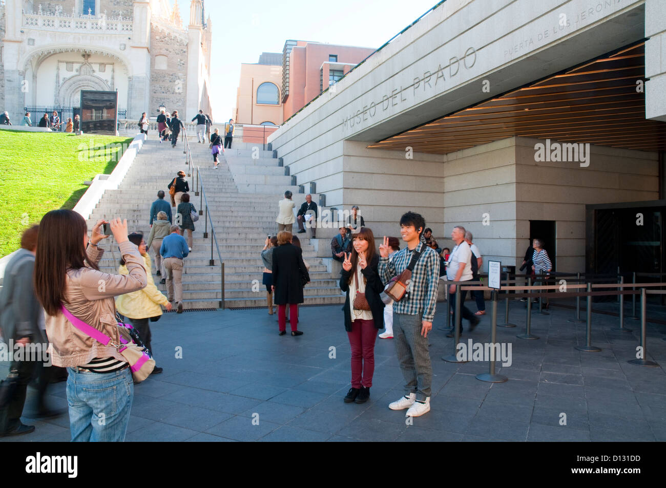 Group of Japanese tourists taking photos at The Prado Museum. Madrid, Spain. Stock Photo