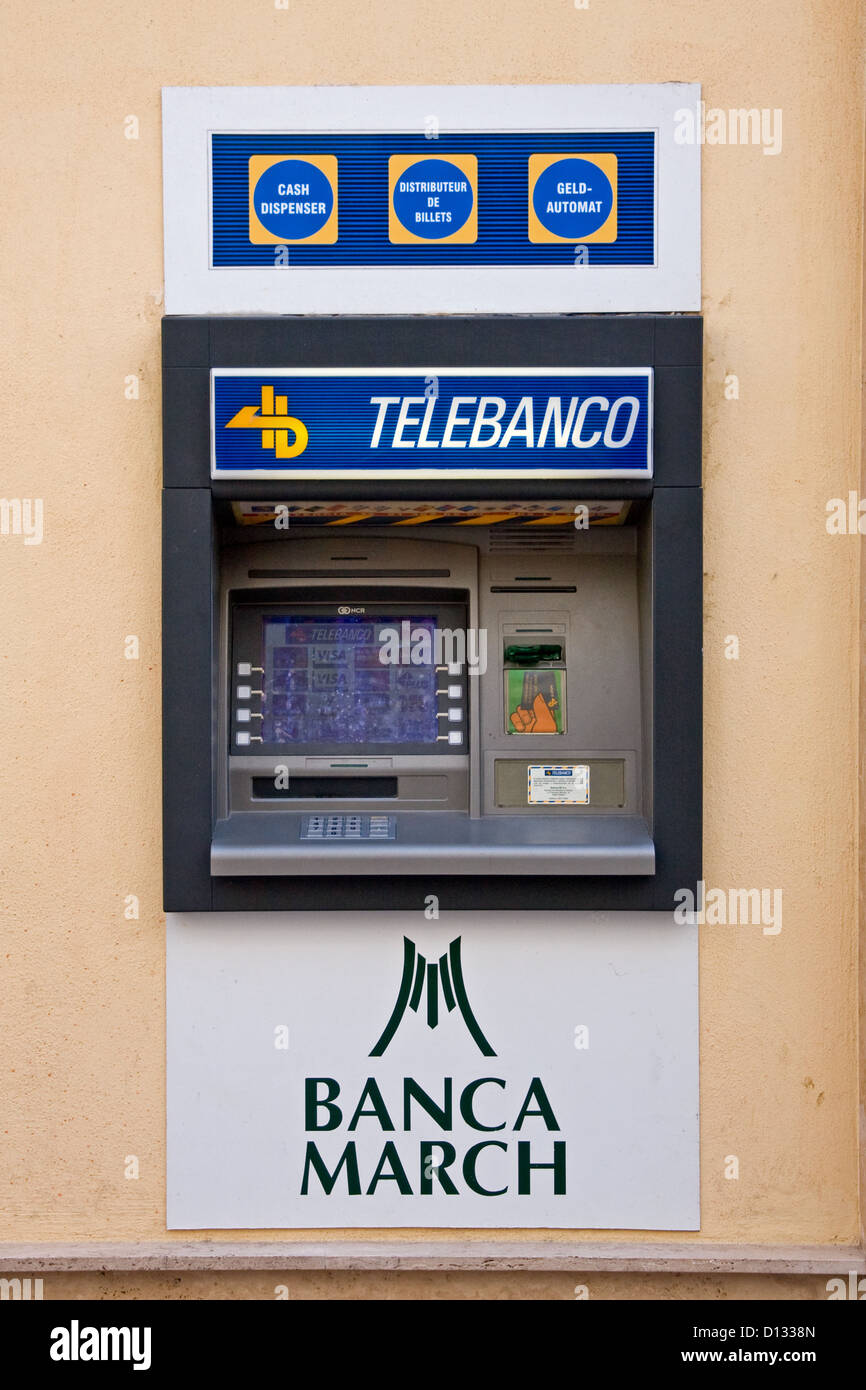 Cash dispensing machine outside branch of Banca March, Nerja Stock Photo
