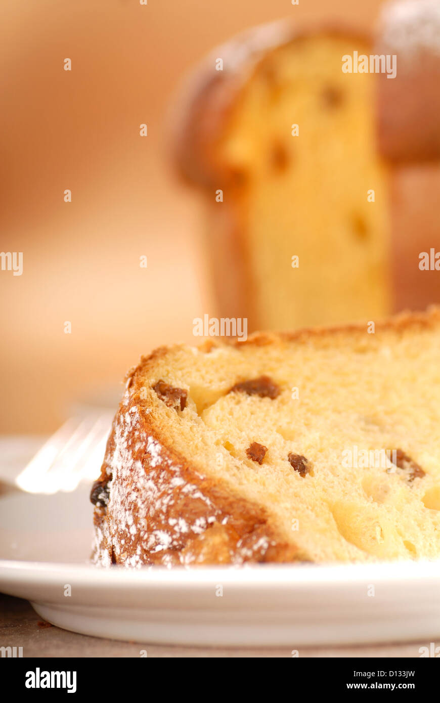 Freshly baked Italian Panettone Christmas Bread with a slice cut out Stock Photo