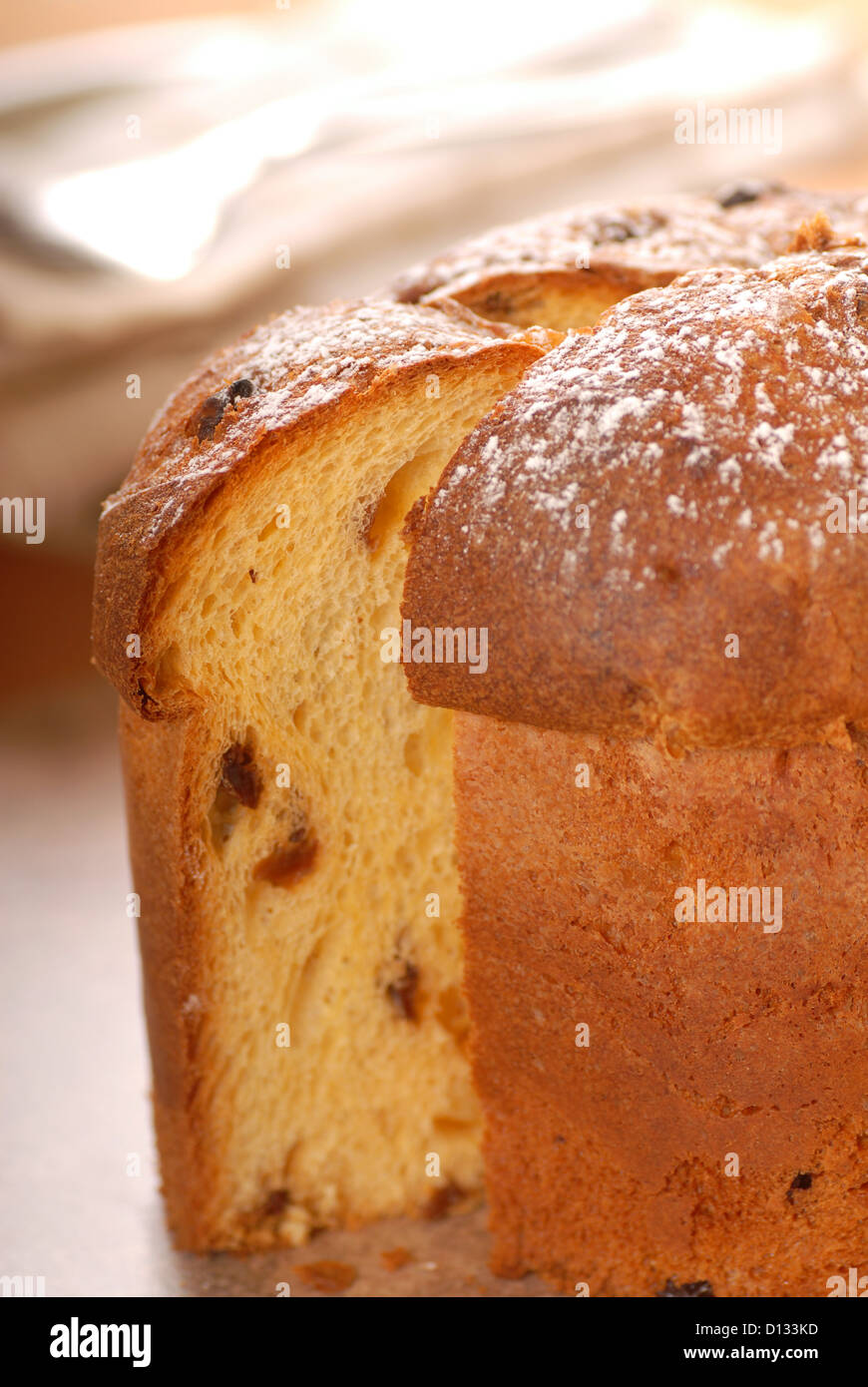 Freshly baked Italian Panettone Christmas bread with a slice cut out Stock Photo