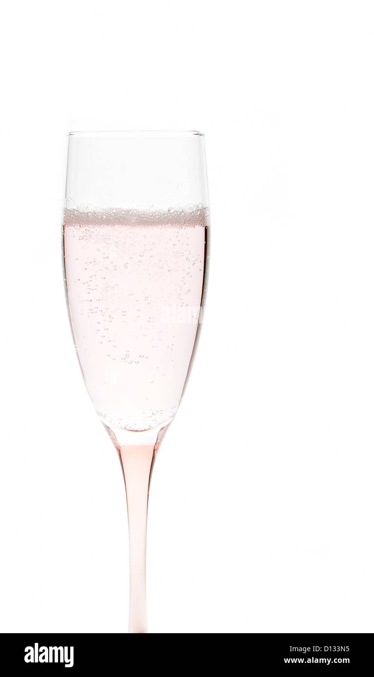 Glass of pale pink champagne on white background Stock Photo