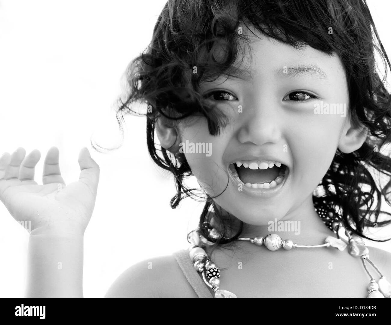 Portrait of the beautiful small Asian girl. Indonesia. Java Stock Photo