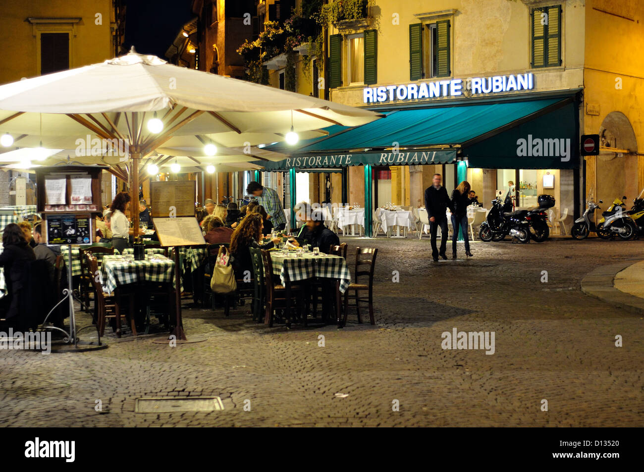 Italy, Veneto, Verona, Restaurant at Night Stock Photo