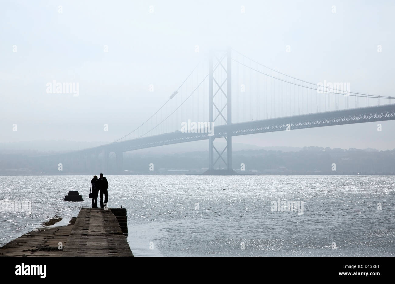 Silhouette couple bridge hi-res stock photography and images - Alamy