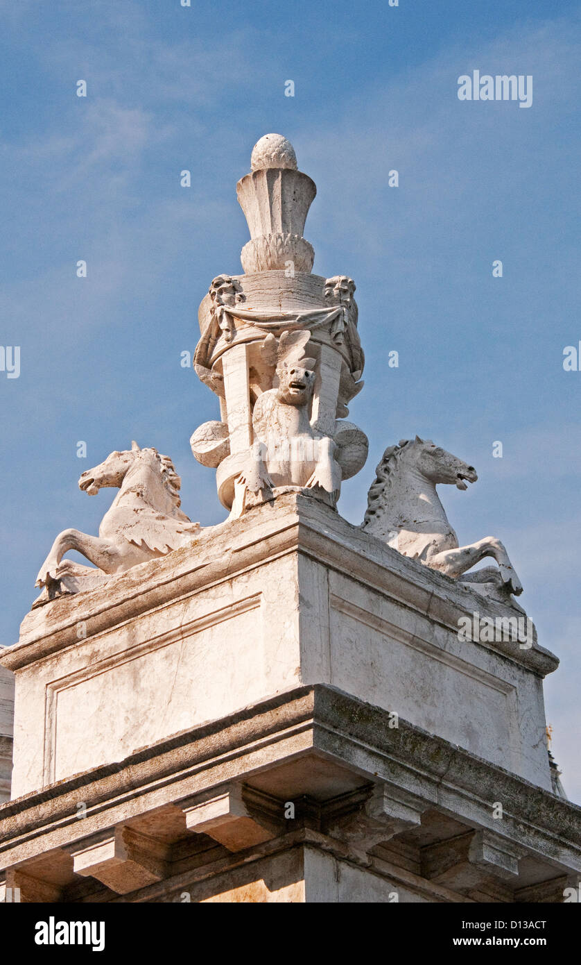 Statues on top of building, Venice, Italy Stock Photo