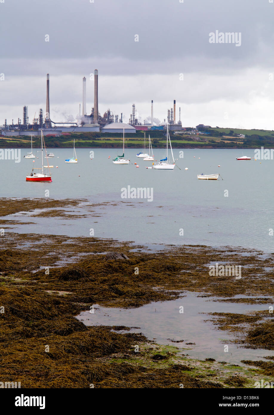 Milford Haven oil refinery and LNG terminal viewed across the estuary from Angle in Pembrokeshire South Wales UK Stock Photo